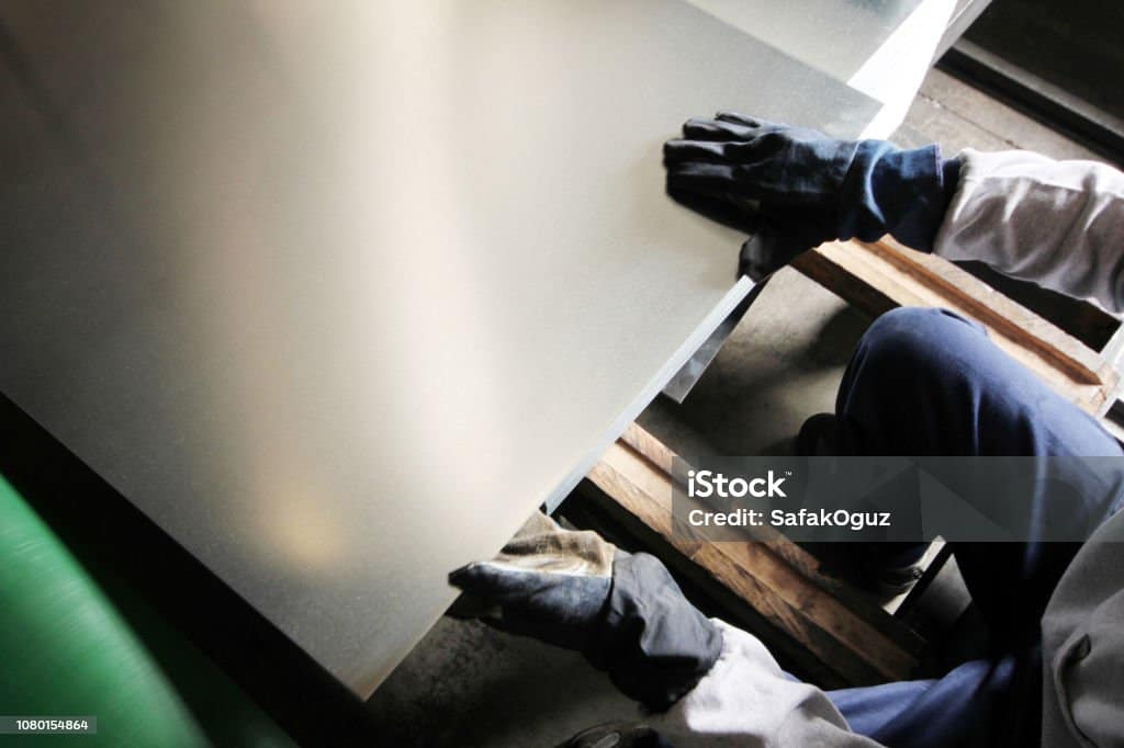Worker Working In Metal Cutting