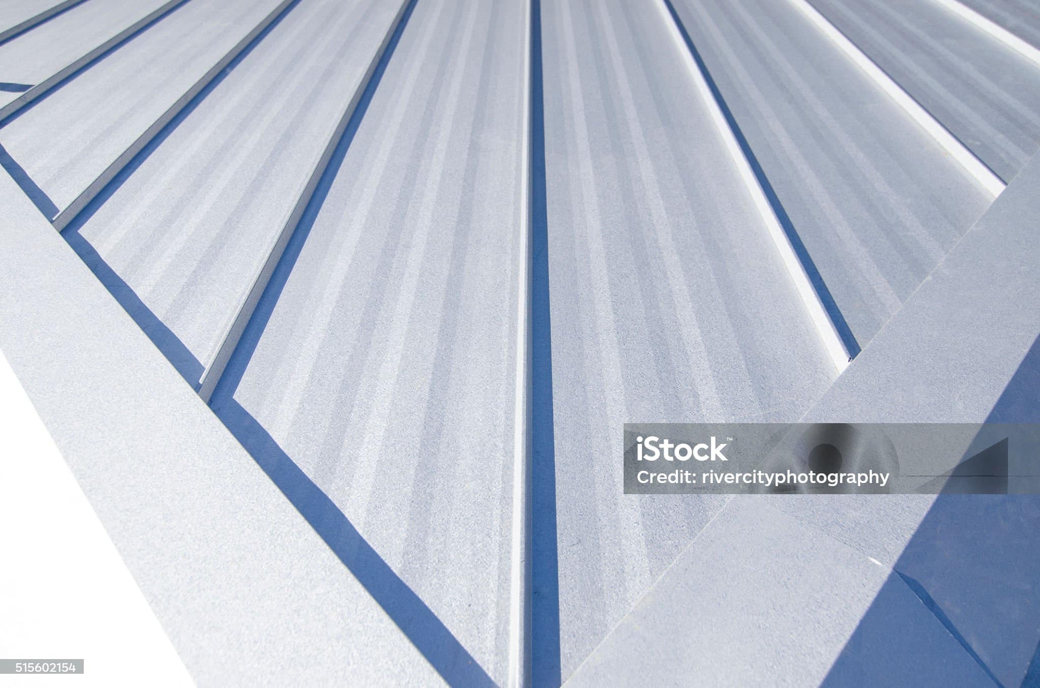 Single Loc Standing Seam Metal Roof With Hips Running To The Ridge.